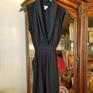 Black dress with pockets and built in tie belt.